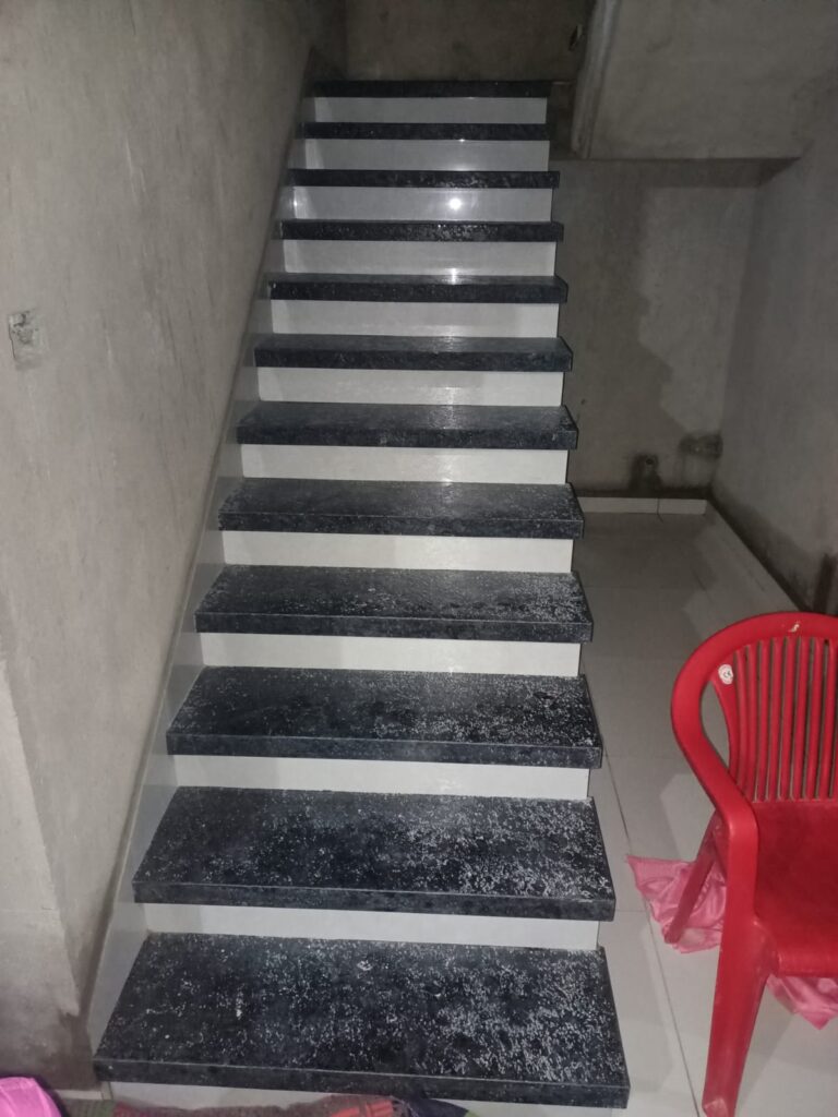 Granite staircase making by Lalchand Saini tile contractor in Vadodara